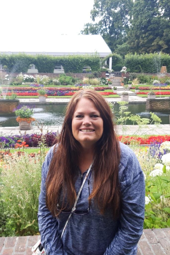 Amy Perry, founder of Knollwood Agriculture, in a garden
